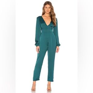 ASTR the Label Dusk To Dawn jumpsuit in the teal color and charmeuse fabric